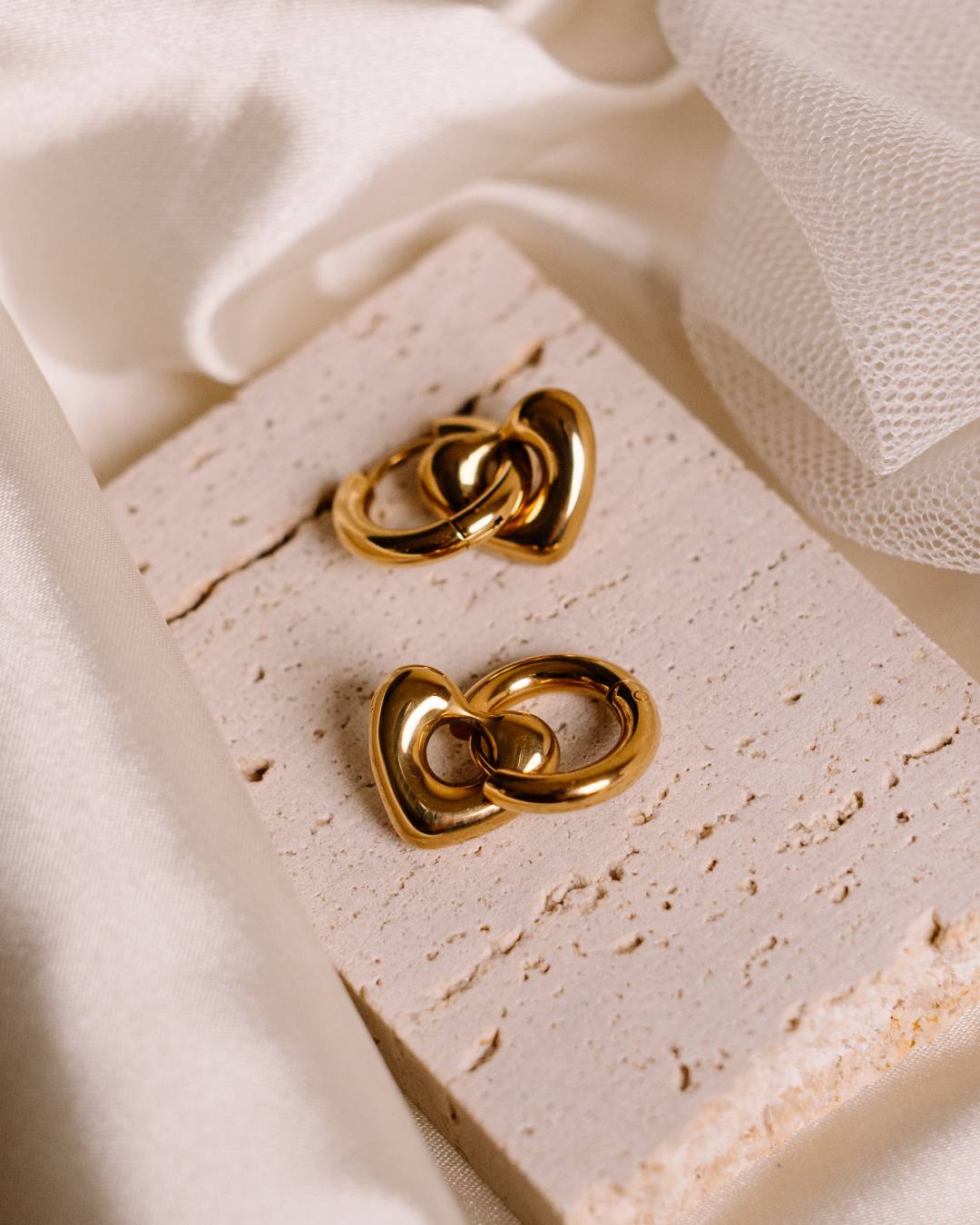 Waterproof gold plated huggie hoop earring with removable heart charm
