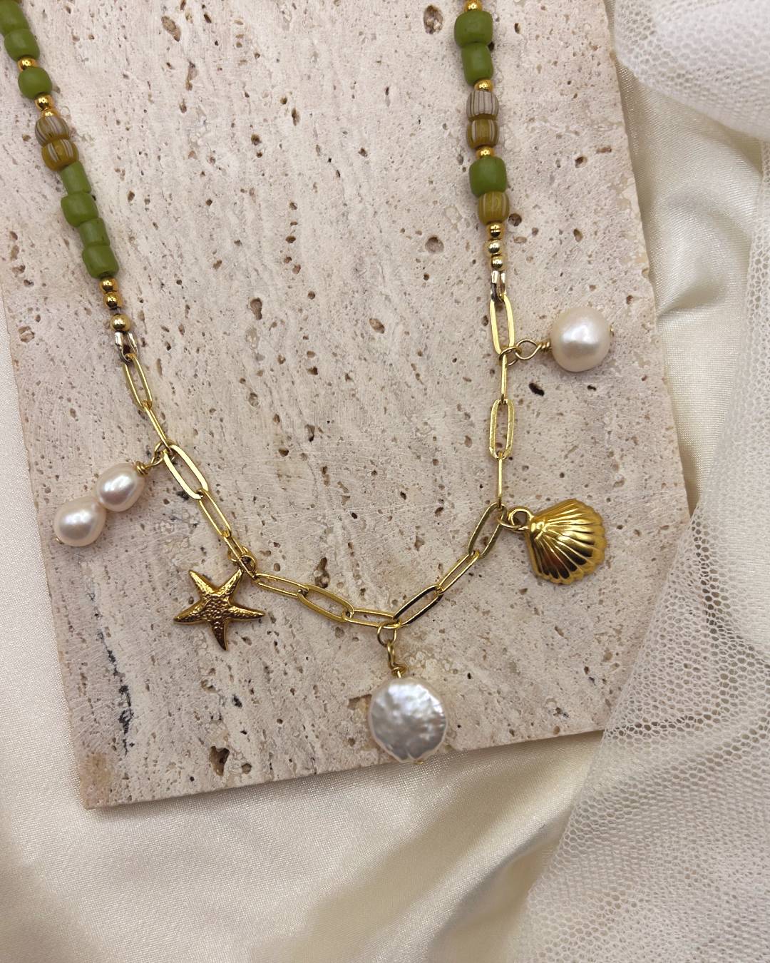 Handcrafted beaded necklace with gold plated paperclip chain and customisable jewellery charm