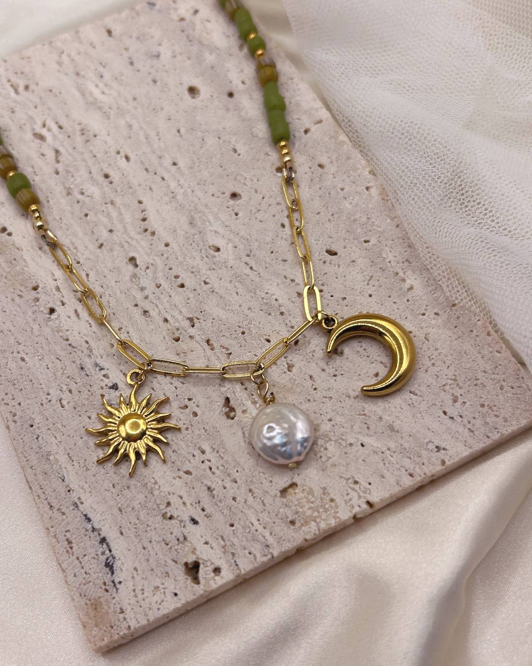 Handcrafted beaded necklace with gold plated paperclip chain and customisable jewellery charm