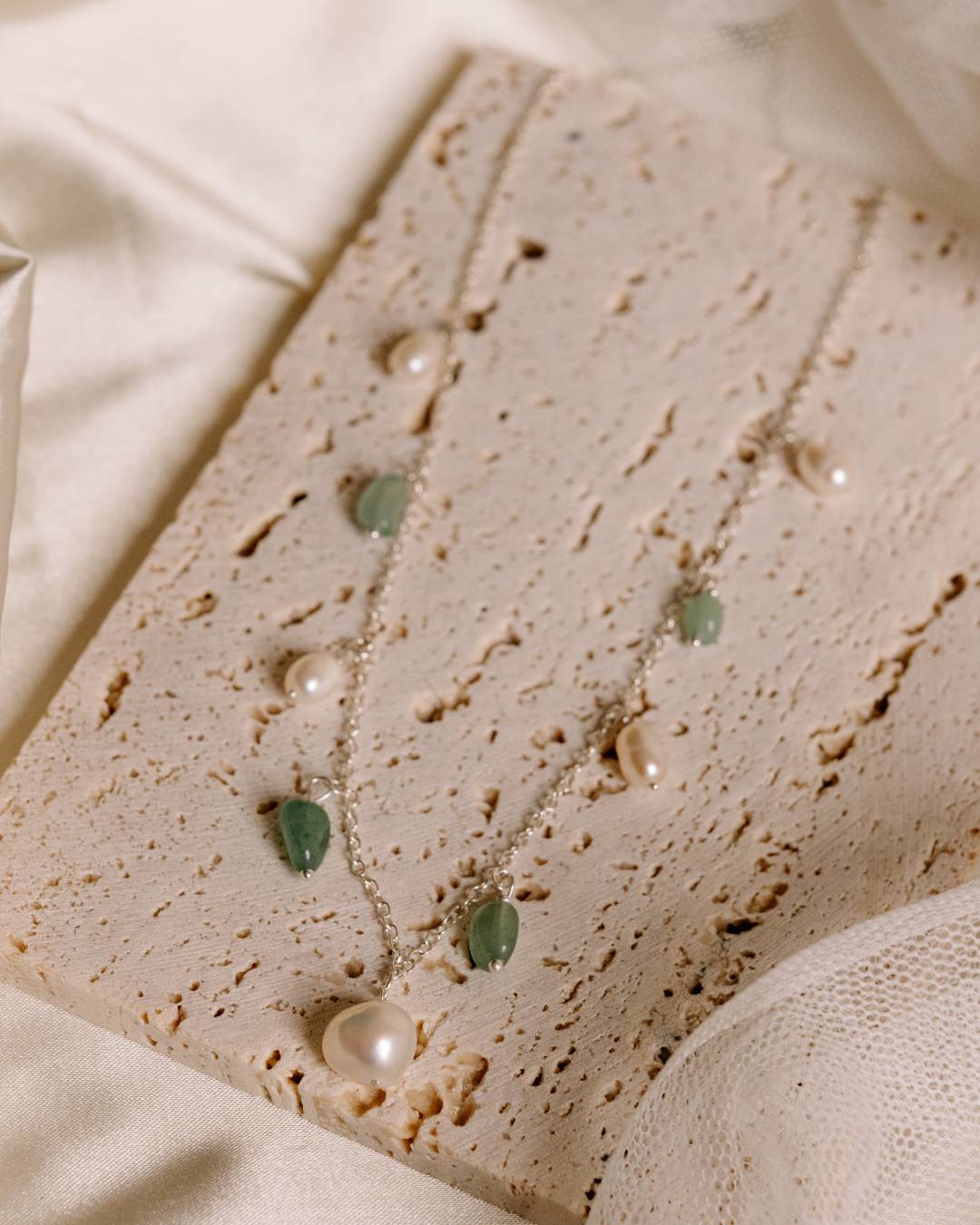 Handcrafted sterling silver beaded necklace with freshwater pearls