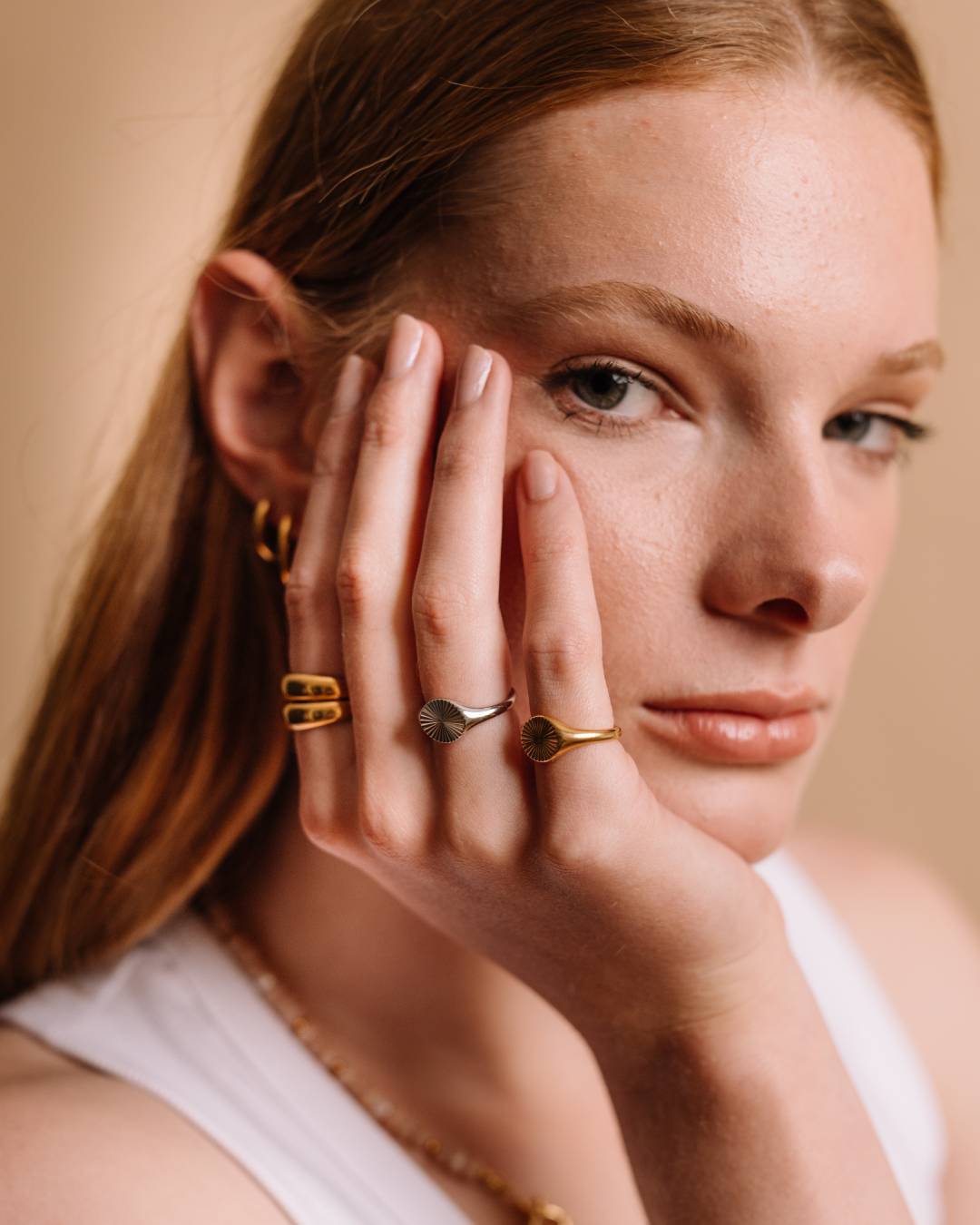 Silver and gold signet ring stack