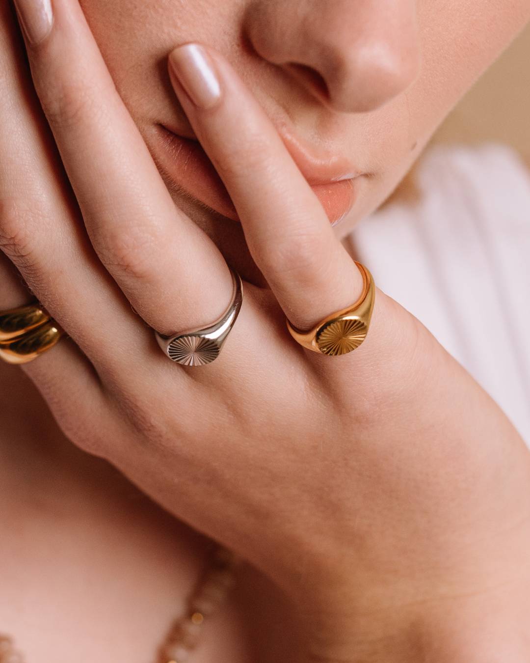 Silver and gold signet rings