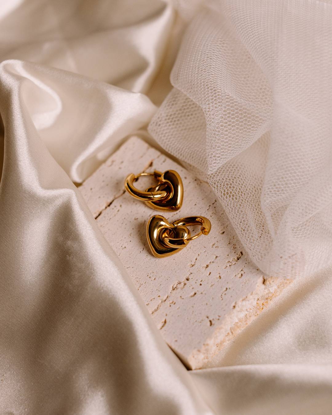 Waterproof gold plated huggie hoop earring with removable heart charm