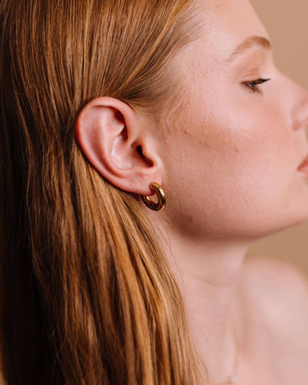 Waterproof gold plated huggie hoop earring