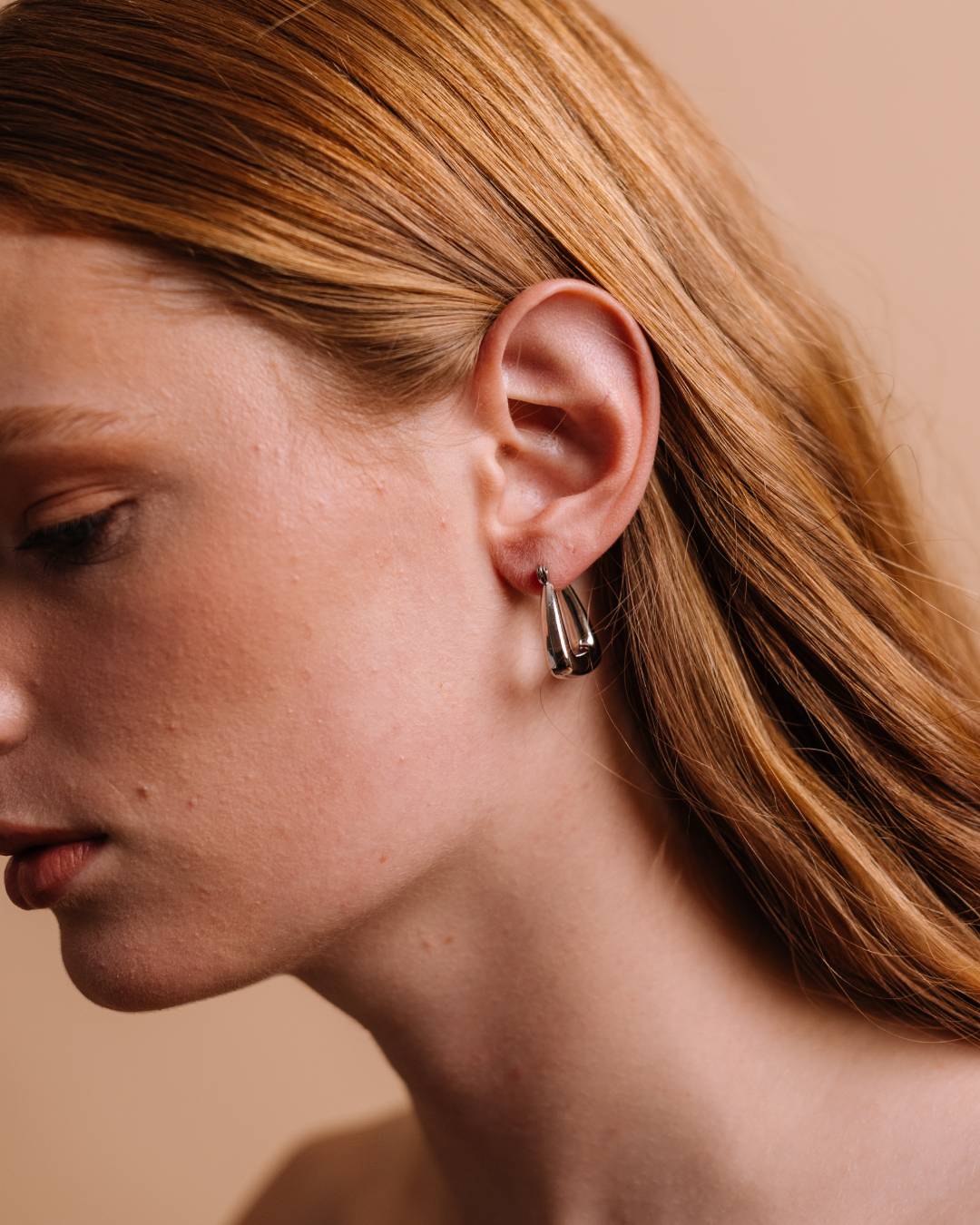 Silver waterproof hoop earring